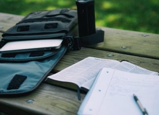 two books on wood plank