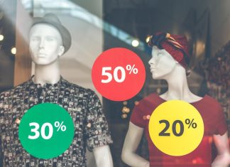 Must-Know Shopping Tips for the Smart Shopper A picture containing person, sign, holding, person Description automatically generated