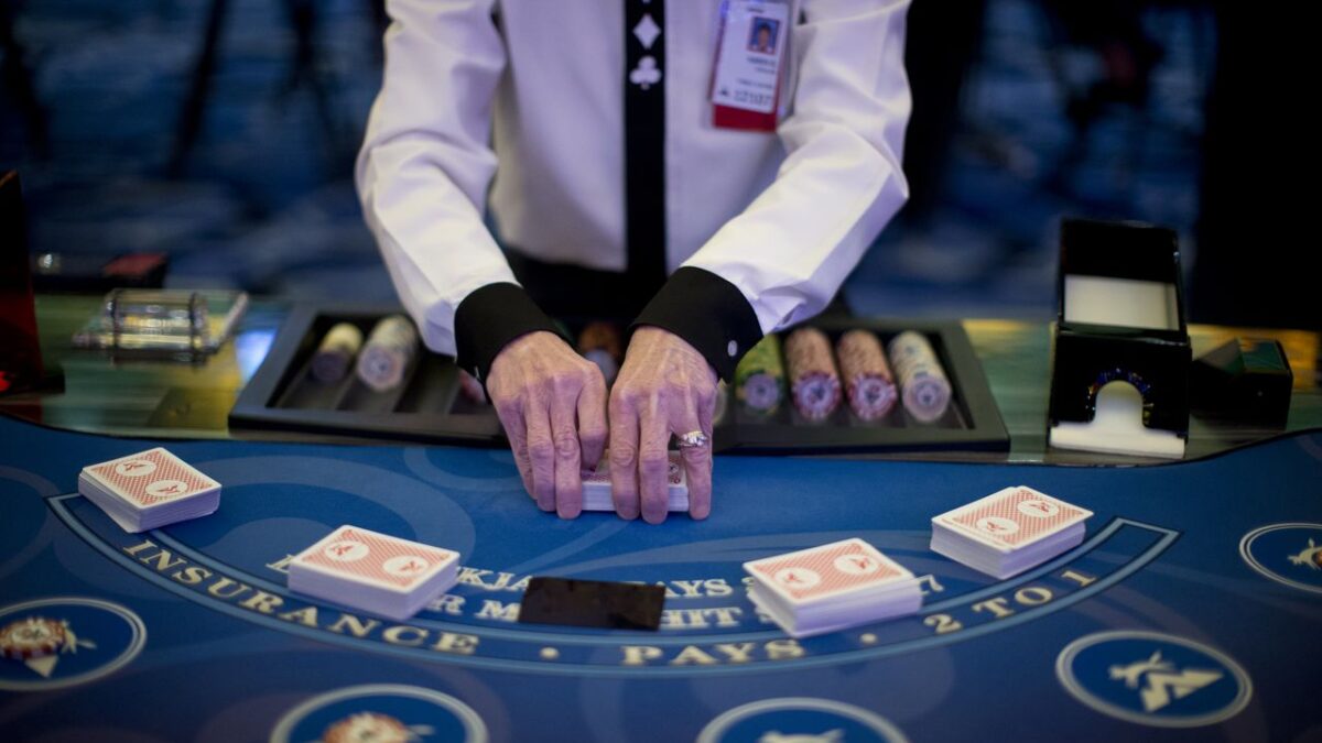 A picture containing text, room, gambling house, scene

Description automatically generated