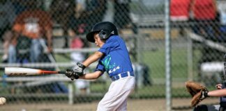 oy playing baseball