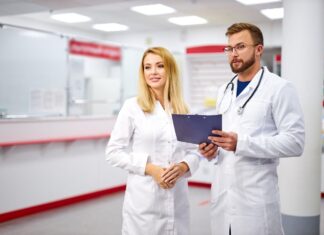 A picture containing person, indoor, ceiling, standing Description automatically generated