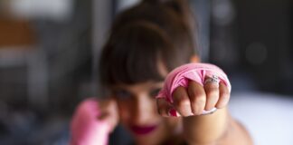 focus photography of woman's fist