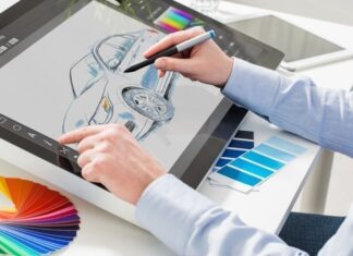 Una persona con una laptop Descripción generada automáticamente con confianza baja