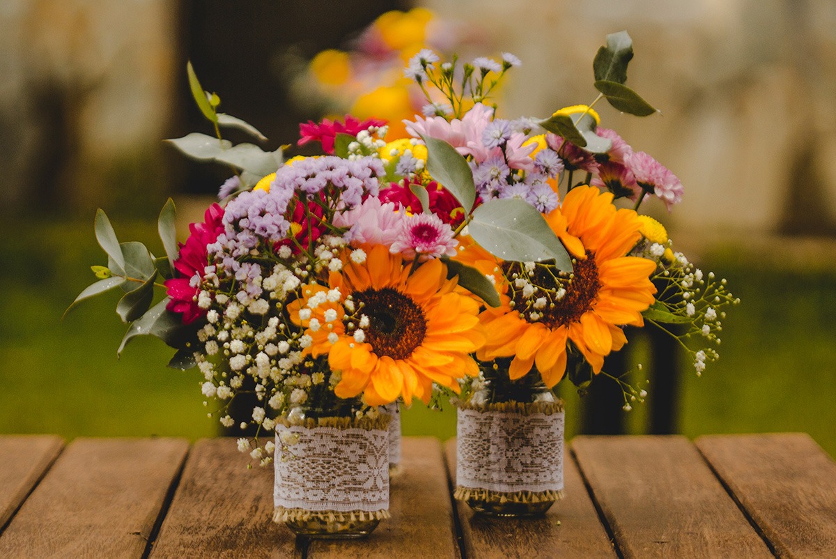 A picture containing flower, plant, bouquet, wooden
Description automatically generated