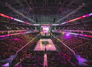 A picture containing laser, indoor, scene, post Description automatically generated