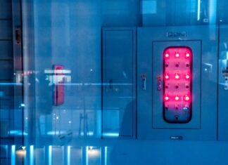 Honeywell addressable panels – Should you get it? white and red switch on gray wall