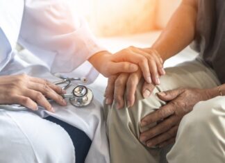 Reasons to Buy Health Insurance for Your Parents A picture containing person, indoor, room Description automatically generated