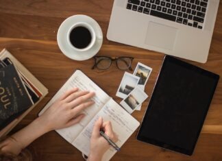5 Ways to Improve Online Learning person holding ballpoint pen writing on notebook