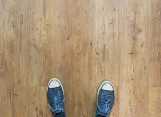Five Best Flooring Solutions for Your House person wearing blue-and-white low-top sneakers