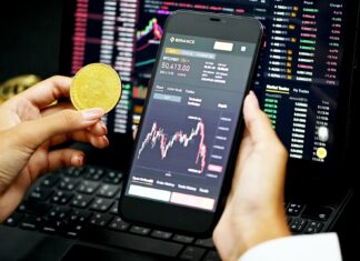 Cryptocurrency and Your Credit Usage person holding black android smartphone