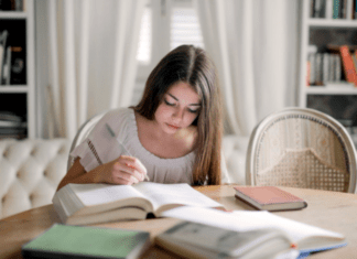 What To Do the Night before an Important Exam A person reading a book Description automatically generated with medium confidence