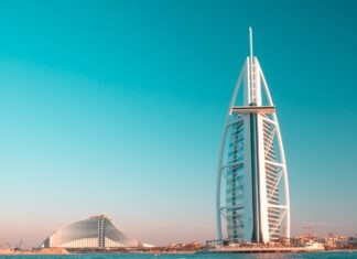 5 fun things to do in Dubai white metal bridge under blue sky during daytime