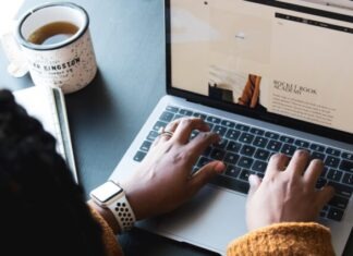 Do You Have a Desktop or Laptop Computer? All of Ahyanah Mincy’s Ideas for Online Side Hustles Can Be Found Here. person using macbook pro on black table