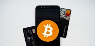 black android smartphone on white surface