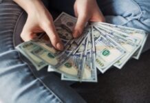 12 Best Side Hustle Ideas for Women to Make Extra Money fan of 100 U.S. dollar banknotes