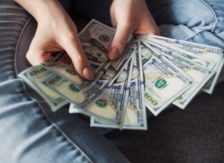 12 Best Side Hustle Ideas for Women to Make Extra Money fan of 100 U.S. dollar banknotes