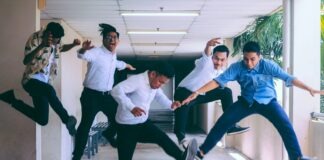 group of people doing jump shot photography