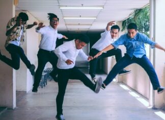 5 Reasons Why Employees Need Regular Breaks group of people doing jump shot photography