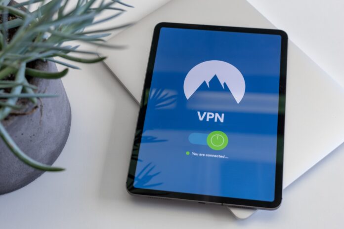 Photo by Petter Lagson black tablet computer turned on displaying VPN