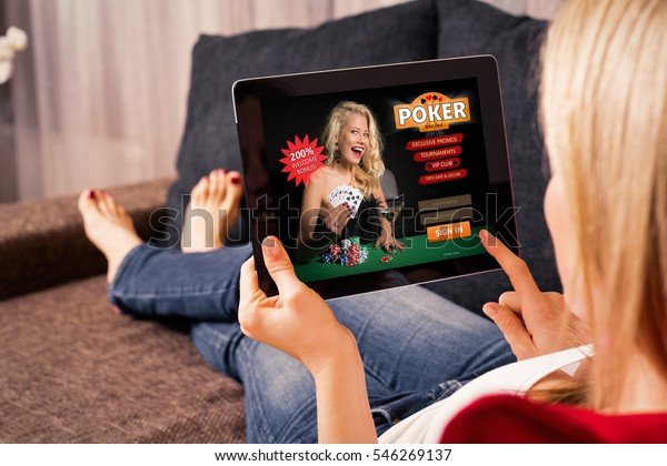 woman-playing-poker-on-tablet Woman playing poker on tablet