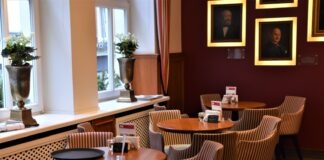 brown wooden table with chairs