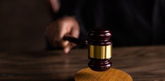 Free Brown Wooden Gavel on Brown Wooden Table Stock Photo
