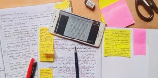 silver iphone 6 on white paper