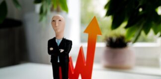 man in black suit jacket and black pants figurine