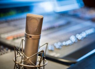Behringer Microphone: The Best Way to Produce Your Music silver microphone near audio mixer