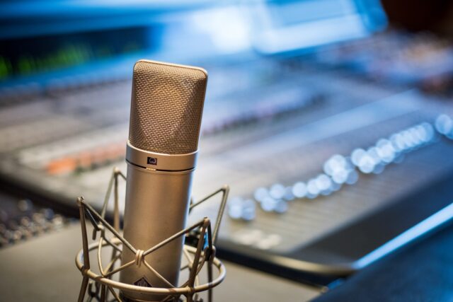 Photo by Jacek Dylag silver microphone near audio mixer
