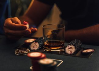 Who are the best celebrity poker players? person holding clear drinking glass