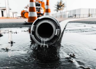 What Business Owners Should Know About Water Damage water coming out from gray pipe