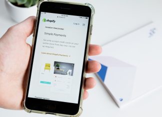 Everything You Need To Know About Shipping Within The Shopify Platform person holding space gray iphone 6