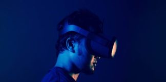 man in black crew neck shirt wearing black headphones