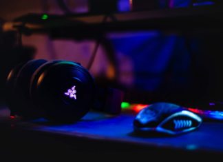 Destiny 2 Meta Today: Top 8 Weapons for PvP and PvE Activities Razer headset near computer mouse