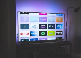 5 Benefits of Bundling TV and Internet black flat screen tv turned on showing game