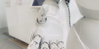 closeup photo of white robot arm
