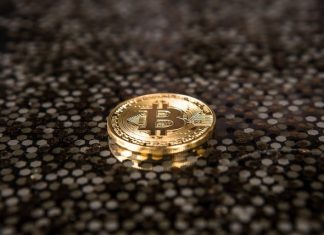 Why Large Mining Pools Are Bad for Cryptocurrency gold-colored Bitcoin coin on ground