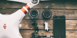 white and red DJI quadcopter drone