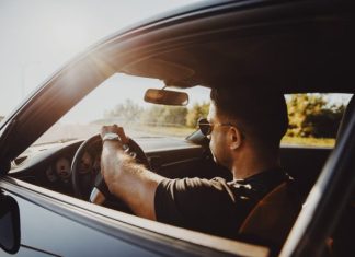 Advantages of Hiring A Drunk Driving Accident Attorney man in black jacket driving car during daytime