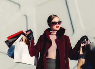 Fashion advice for women in their 40’s. More about fashion and style photo of woman holding white and black paper bags