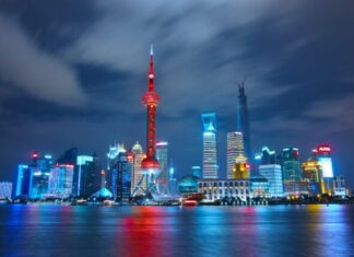 The Concept That Blooms the Digital Yuan architectural photograph of lighted city sky