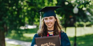 woman in academic dress wearing academic hat