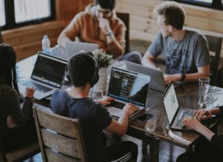 Things To Look For Before Choosing Marketing Research Company For Your Business group of people using laptop computer