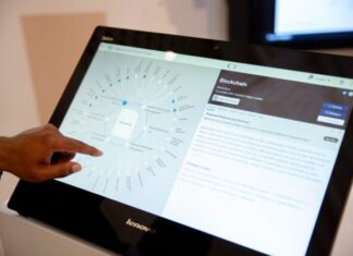 How AI Can Improve Background Checks Lenovo monitor displaying texts