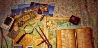 brown wooden scissors on brown and white book