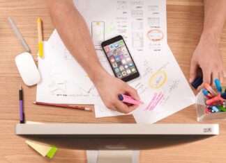 3 Benefits of Good Digital Marketing Practices person writing on white paper