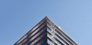 white and brown concrete building under blue sky during daytime