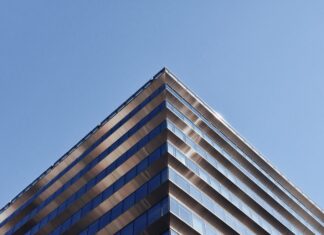 white and brown concrete building under blue sky during daytime
