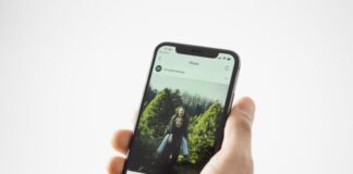 person using black smartphone